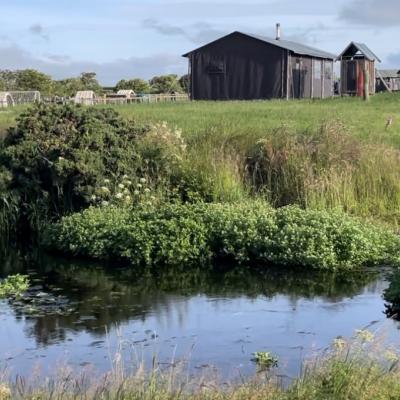 Off grid safari tents next to the water at Balnab Dairy Farm